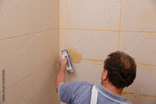 After laying the tiles on the wall, you must fill the spaces between the tiles, a special cement mass or fugue.