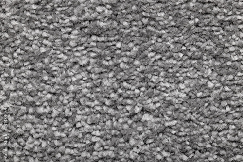 Close up of a clean gray carpet texture or background. Macro shot