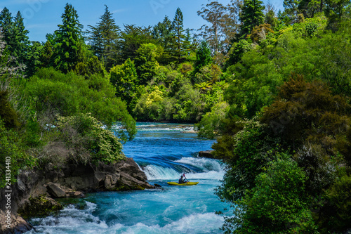 Scenic landscape view of turquoise water of Waikato river and Huka Falls,most popular natural tourist attraction/destination. Great lake Taupo,North Island, New Zealand. Summer active holiday concept.