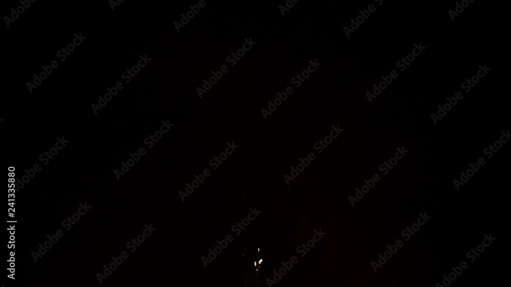 Two wooden torches burning at night. Flaming torches in snow with copy space Two wooden torches burning at night. Flaming torches in snow with copy space
