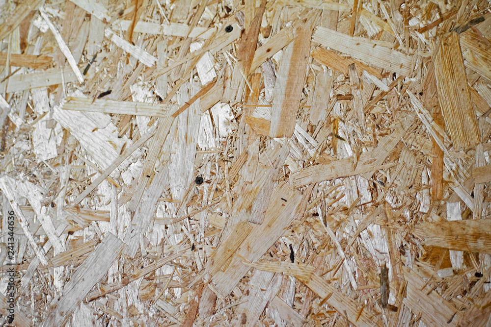 OSB panel texture. Wood texture. Osb wood board for background decoration. Strand Board. Chipboard building material.