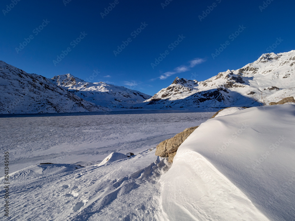 Icy lake in the italian alps