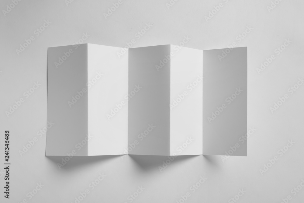 Blank brochure on white background, above view. Mock up for design Blank brochure on white background, above view. Mock up for design