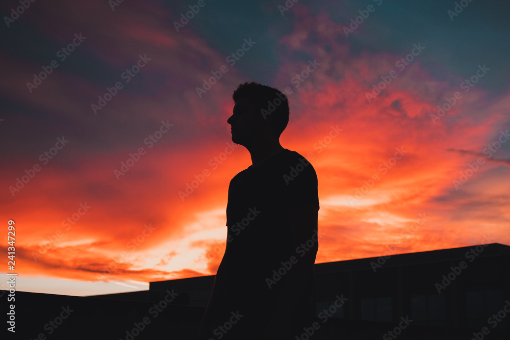 Beautiful Colorful Sunset Silhouette of Man