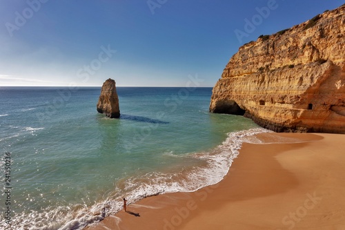 Rock at the sandy beach Praia do Carvalho, Carvoeiro, Algarve, Portugal, Europe photo