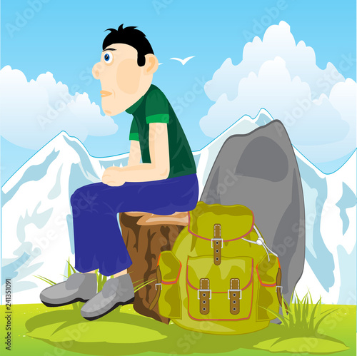 Man travellier on glade on background of the snow mountains