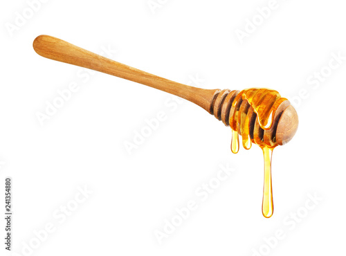 Honey dripping isolated on a white background, Dripped honey, Honey dipper