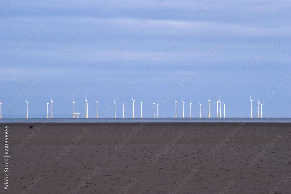 Offshore wind turbines on the Solway coast, Southerness, Dumfries, Scotland.