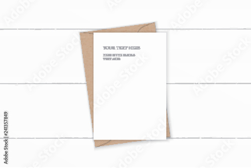 Flat lay top view elegant white composition letter kraft paper envelope on wooden background