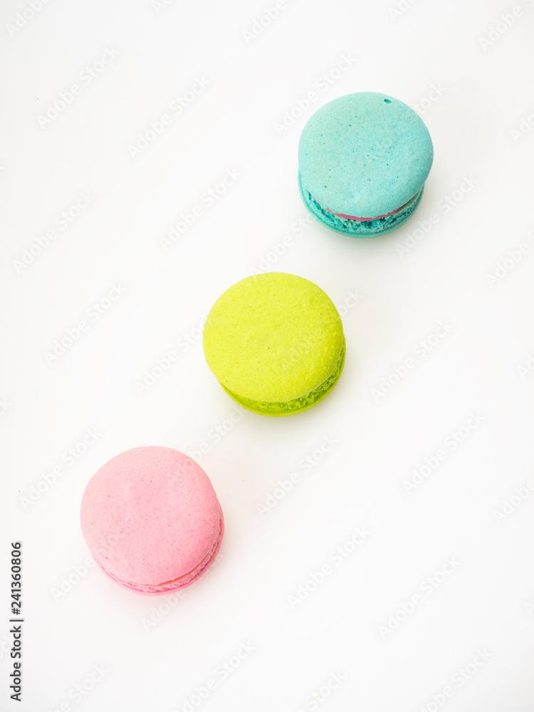 Obraz premium Sweet three macarons love on white