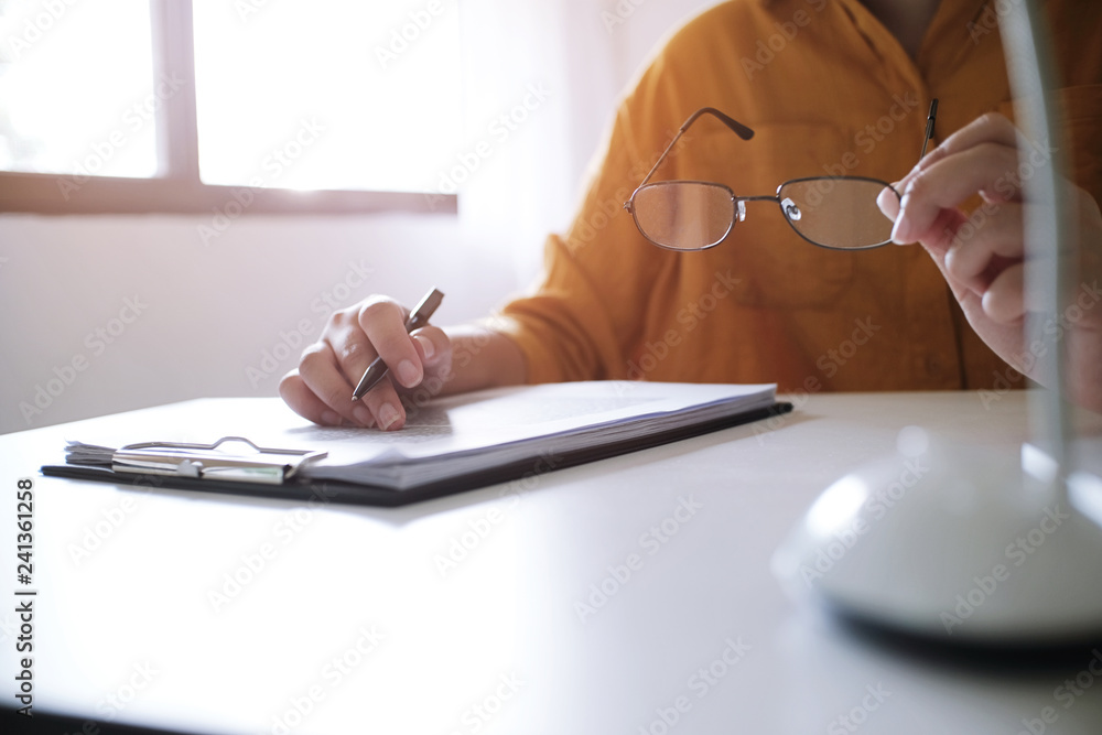 Fototapeta premium Business accounting women work with calculator and Laptop. Financial technology concept