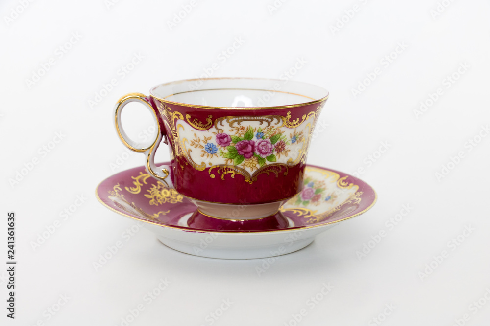 Teacup in a saucer. Fine china. Porcelain tea cup. Teacup in a saucer. Fine china. Porcelain tea cup.