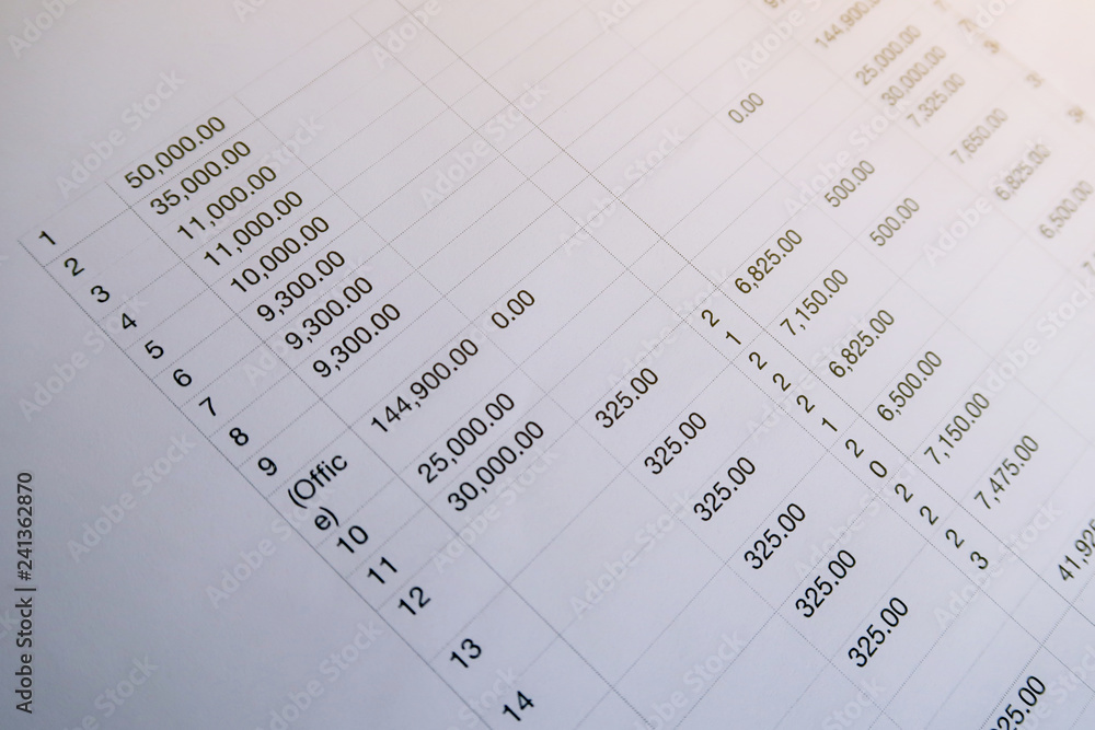 Businesswoman analyzing investment charts and pressing calculator buttons over documents. Accounting Concept. Businesswoman analyzing investment charts and pressing calculator buttons over documents. Accounting Concept.