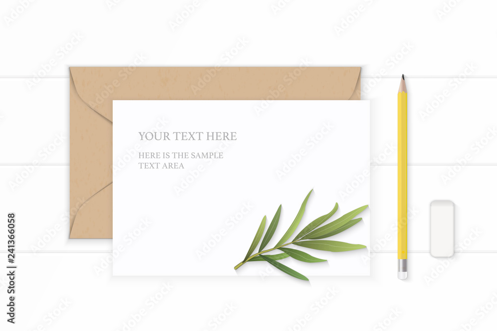 Flat lay top view elegant white composition letter kraft paper envelope yellow pencil eraser and tarragon leaf on wooden background Flat lay top view elegant white composition letter kraft paper envelope yellow pencil eraser and tarragon leaf on wooden background