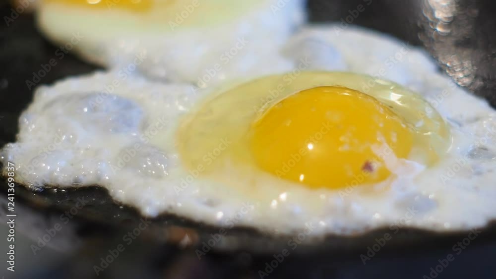 Delicious fried eggs on the pan Delicious fried eggs on the pan
