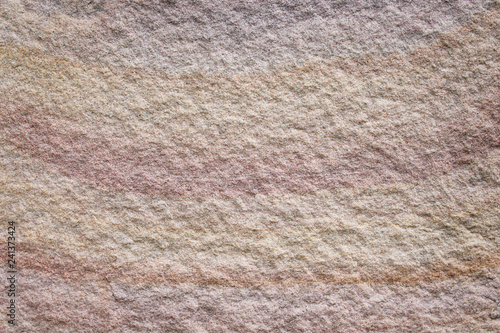 Texture brown sandstone in colorful patterns on background