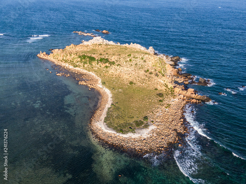 Rocky island in the middle of the ocean
