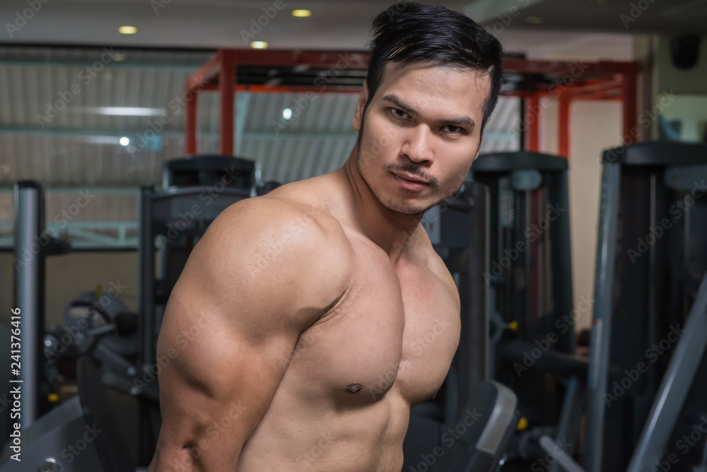 personal fitness trainer show his muscles or Strong bald bodybuilder with six pack personal fitness trainer show his muscles or Strong bald bodybuilder with six pack