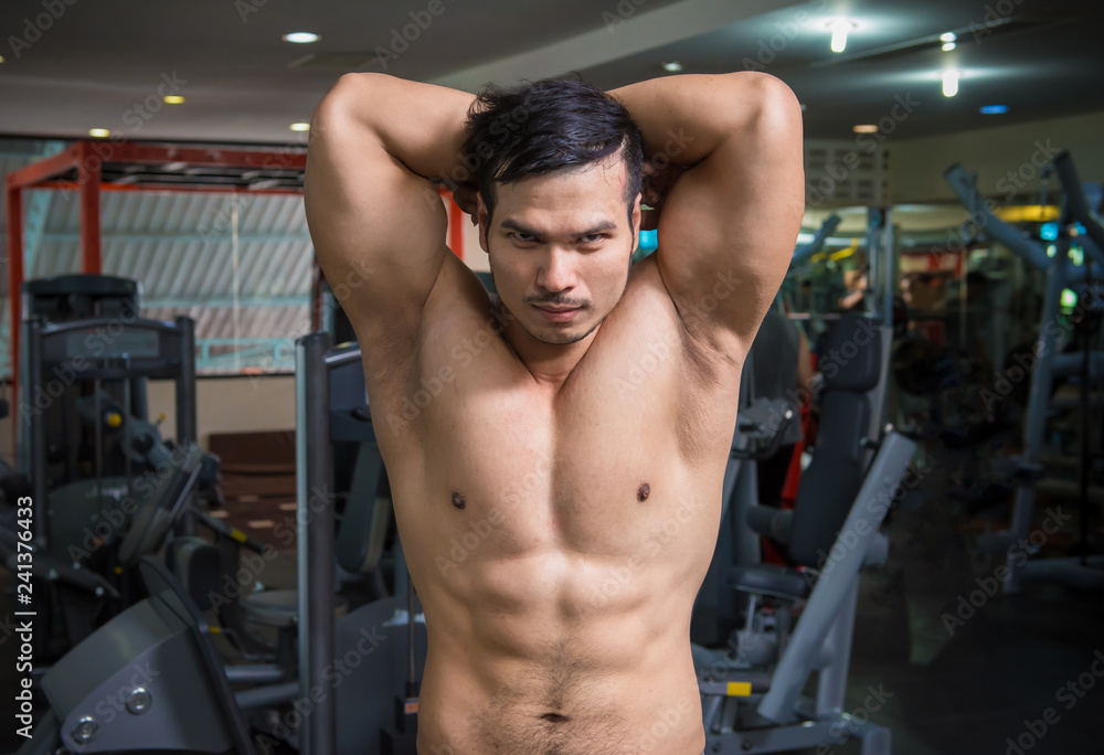 personal fitness trainer show his muscles or Strong bald bodybuilder with six pack personal fitness trainer show his muscles or Strong bald bodybuilder with six pack
