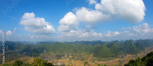 Amazing rice fields in valley with karst mountains and limestone peaks in Bac Son, Vietnam