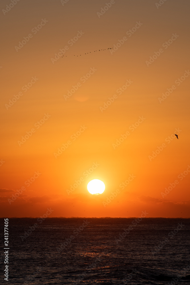 Beautiful sunrise over the ocean. South Korea at the sunrise of the East Sea sea. Beautiful sunrise over the ocean. South Korea at the sunrise of the East Sea sea.