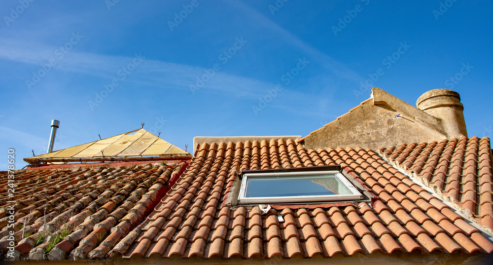 Roof in terracotta tiles with skylight Roof in terracotta tiles with skylight