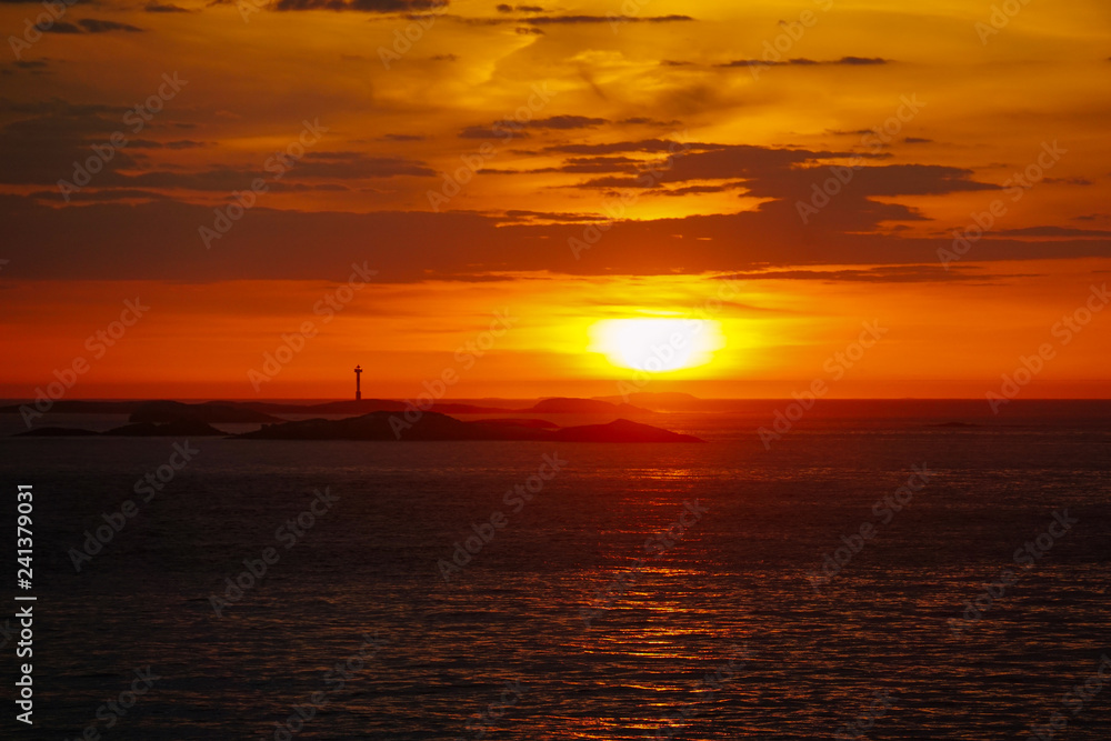 Colorful beautiful sunset at Atlantic Ocean in Norway