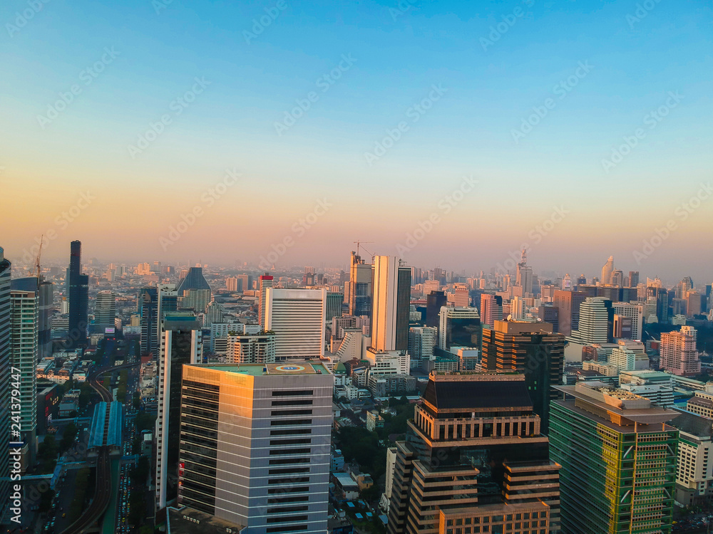 Fototapeta premium Industrial office building sunrise colorful sky aerial view