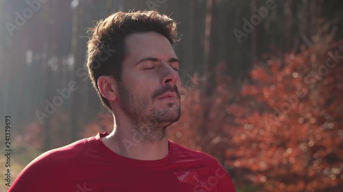 Man taking a deep breath
