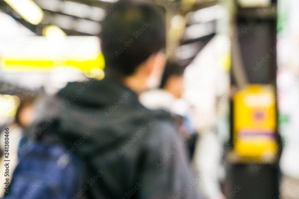 Obraz premium Blurred group of tourist people at train station