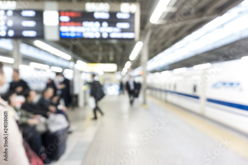 Blurred background of people hurry up walking in train station