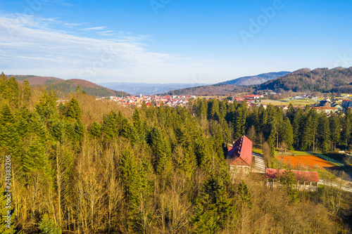 Croatia, Delnice, Gorski kotar, panoramic view of town center from drone in winter, mountain landscape in background photo