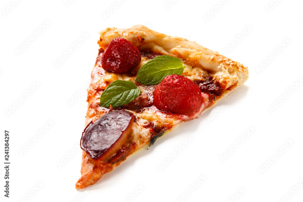 Piece of pizza with plums and strawberries on white background Piece of pizza with plums and strawberries on white background