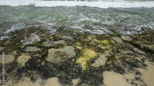 Mettams Pool with low tide, a limestone bay safe for snorkelling place. Trigg Beach in North Beach near Perth, WA. Mettam's is a natural rock pool protected by a reef. Australia wallpaper. photo