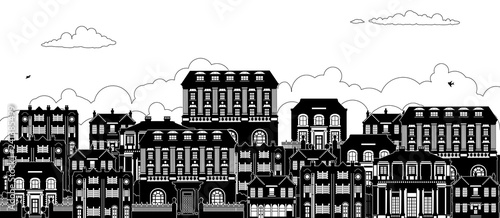A street with a row of houses in Victorian, Georgian and Edwardian styles in silhouette