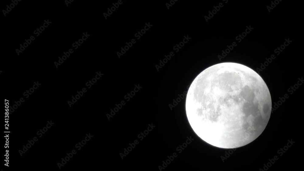 Lunar eclipse - the shadow of the Earth goes from the Moon disk Lunar eclipse - the shadow of the Earth goes from the Moon disk