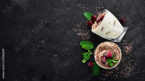 Obraz  z motywem Dessert Tiramisu with cherries. Top view. Free space for your text.