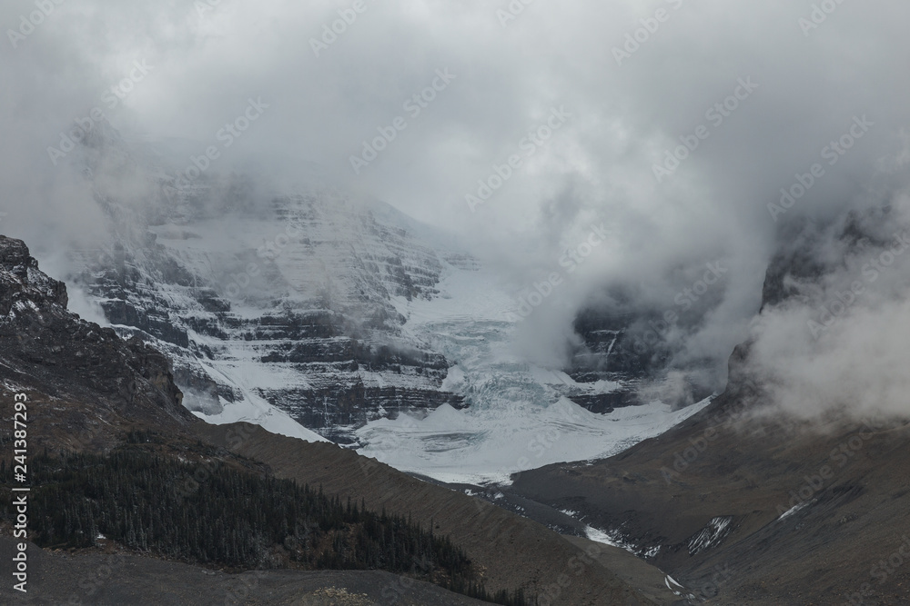 Overcast sky with Mountain view in the Canadian Rockies along the Icefields Parkway in Alberta, Canada.