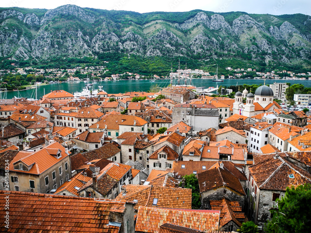 Kotor town, unesco heritage list. Montenegro. Beautiful panorama of orange roofs of medieval town.
