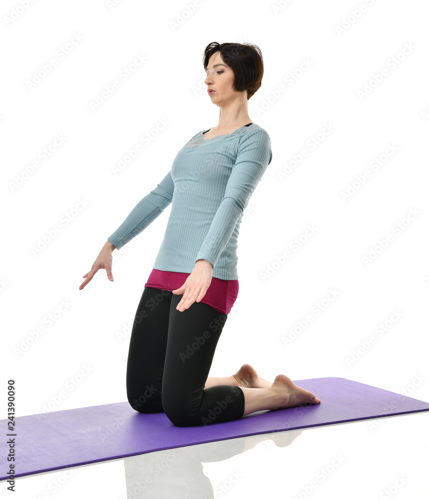 Female fitness instructor doing stretching for hands legs abdominals bar exercise in gym work out isolated on white Female fitness instructor doing stretching for hands legs abdominals bar exercise in gym work out isolated on white