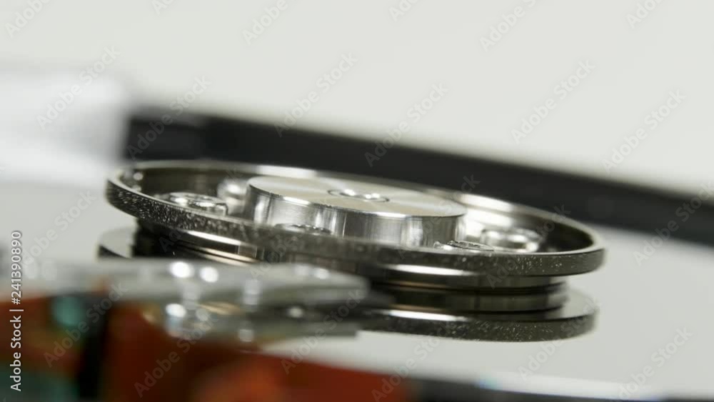 Hard disk drive on the rotation table, macro shot Hard disk drive on the rotation table, macro shot