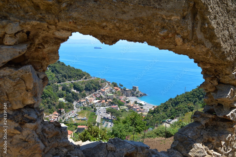 Landscape of the Amalfi coast, seen from a hole in the rock
