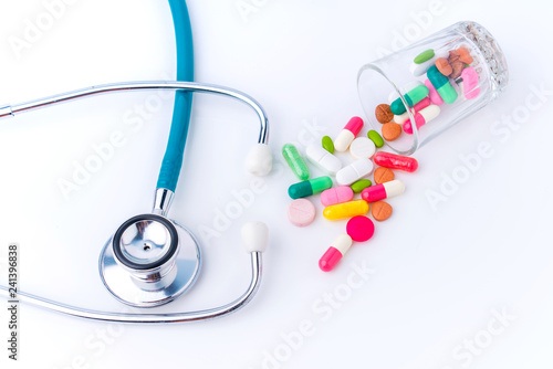 stethoscope and drug pill for doctor and medical nursing people check up healing of patients