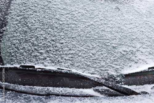 Winter frozen car window