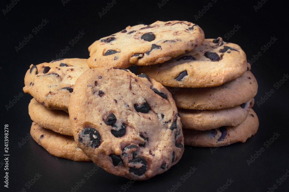 Chocolate cookies at black background. Chocolate cookies at black background.