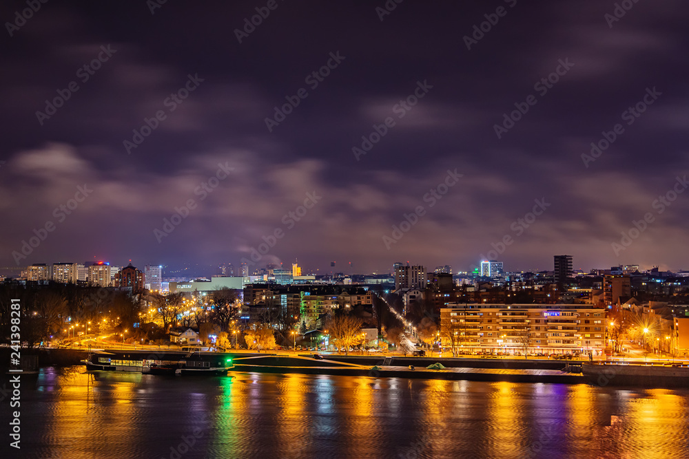 Novi Sad, Serbia - January 01, 2019: Panorama of Novi Sad and Danube river at night