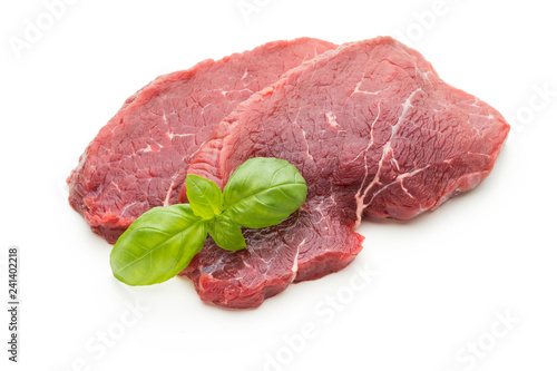 Fresh raw beef steak isolated on white.