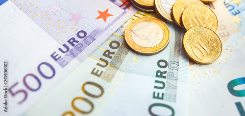 Money close up. American dollar and euro bills.