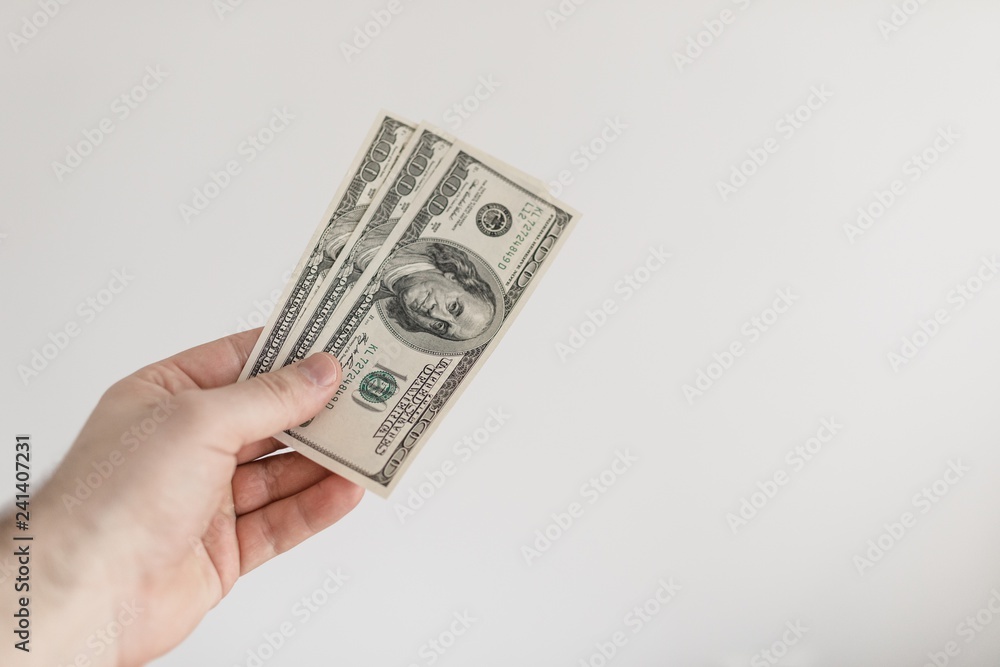 money of american dollar in male hands. money of american dollar in male hands.