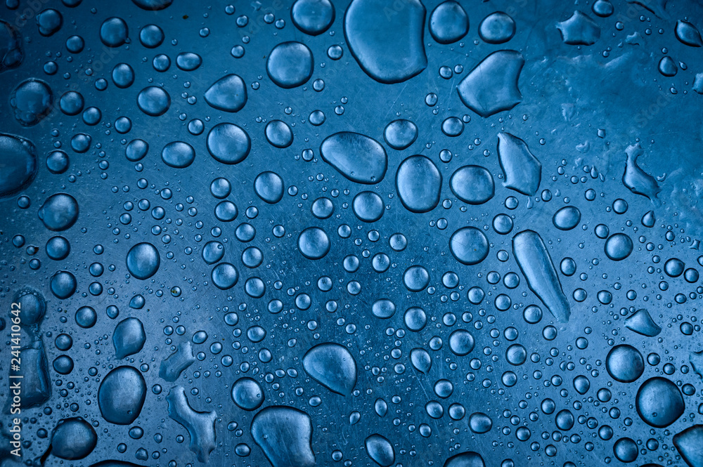 Water drops on metal surface. Macro with shallow depth of field. Water drops on metal surface. Macro with shallow depth of field.
